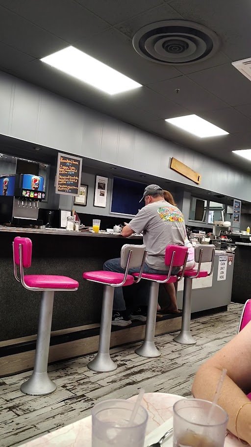 Homemade breakfast served in a simple diner setting.